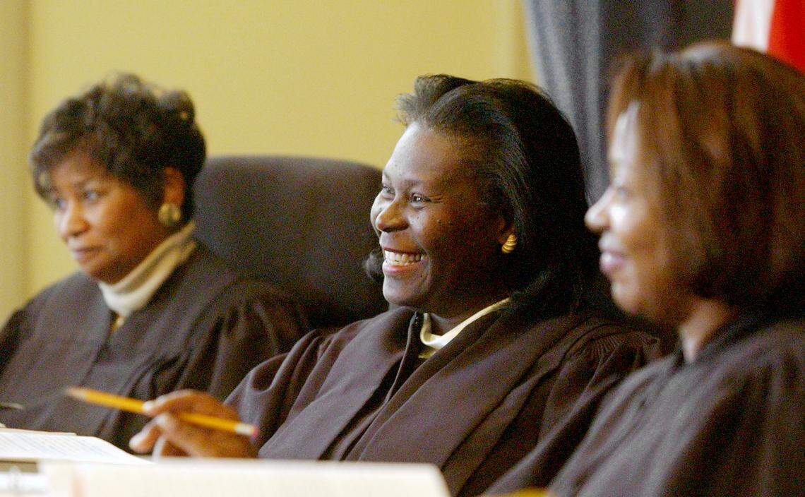 NC Court of Appeals judges, from left, Loretta Biggs, Patricia Timmons-Goodson and Wanda Bryant laugh as one of the attorneys makes his case before them in 2002.