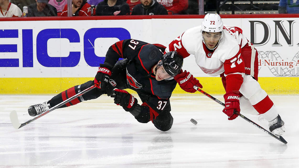 Aho leads goal rush as Canes top Wings 7-3