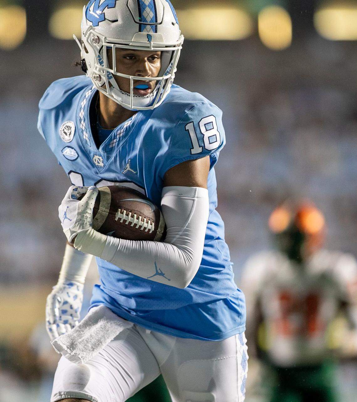 North Carolinas Bryson Nesbit (18) scores a touchdown on a 23-yard pass completions from quarterback Drake Maye in the first quarter against Florida A&M on Saturday, August 27, 2022 at Kenan Stadium in Chapel Hill, N.C.