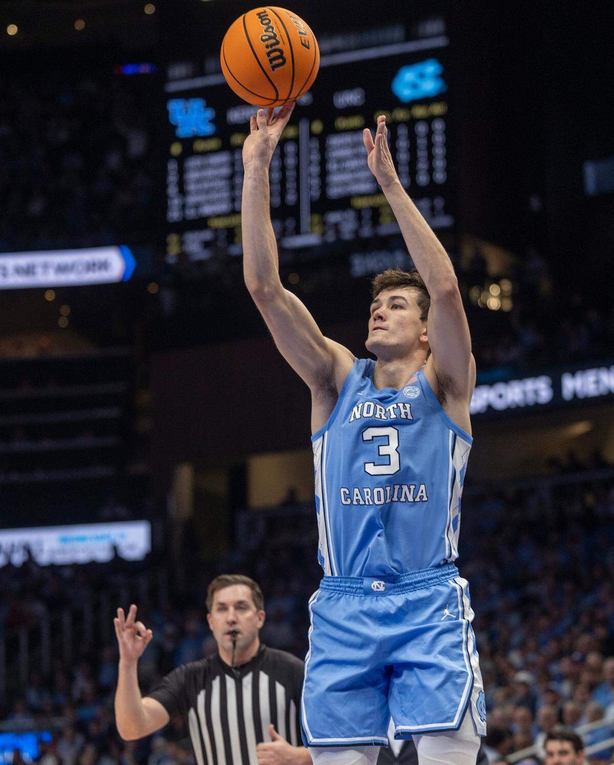 North Carolina’s Cormac Ryan (3) sinks a three point basket in the first half against Kentucky on Saturday, December 16, 2023 at State Farm Arena in Atlanta, Georgia. Ryan had 12 points in the first half.