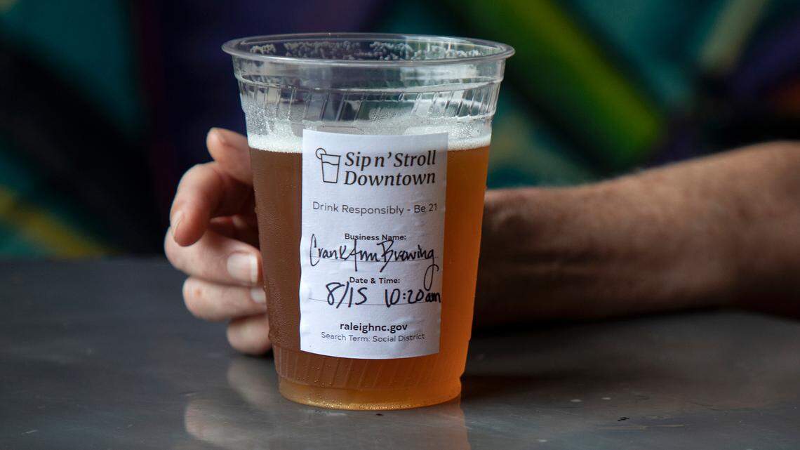 A sticker marks a social district drink at Crank Arm Brewing Company on Monday, August 15, 2022, in Raleigh, N.C. 
