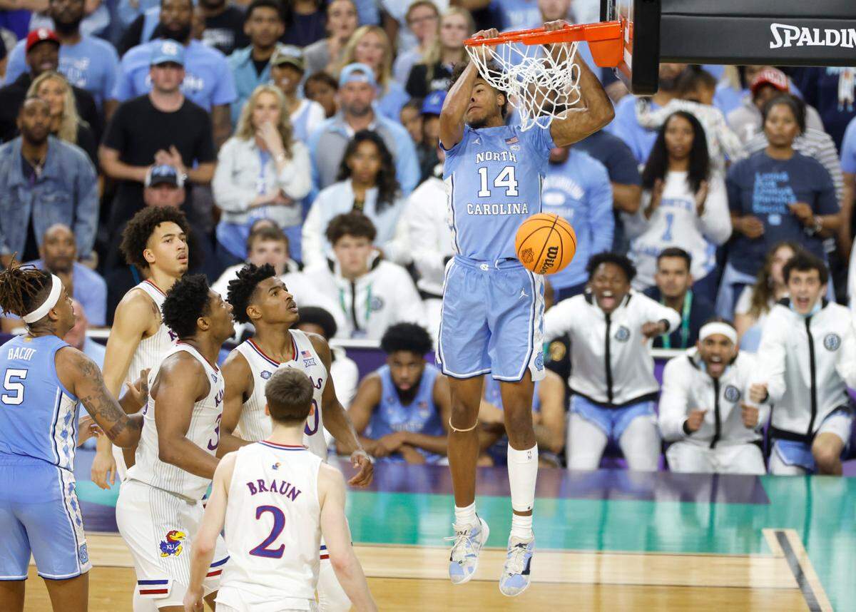 North Carolina’s Puff Johnson (14) slams in two during the second half of Kansas’ 72-69 victory over UNC in the NCAA Men’s National Championship at the Caesars Superdome in New Orleans, La., Monday, April 4, 2022.