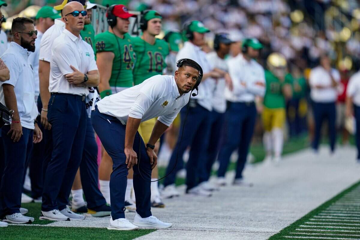Notre Dame head coach Marcus Freeman on the sideline during the second half of an NCAA college football game against California in South Bend, Ind., Saturday, Sept. 17, 2022. Notre Dame defeated California 24-17.(AP Photo/Michael Conroy)
