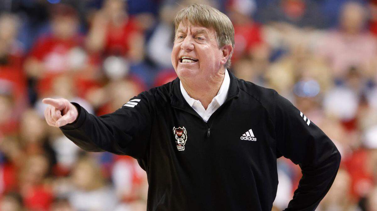 N.C. State head coach Wes Moore instructs his team during the first half of N.C. State’s game against Miami in the championship of the ACC women’s basketball tournament in Greensboro, N.C., Sunday, March 6, 2022.