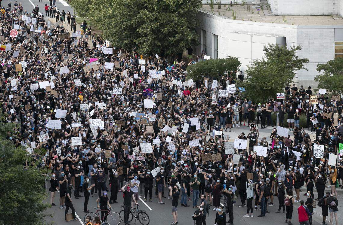 A massive crowd of protesters stop at the Durham County Jail, the first stop of an evening long march through the streets to downtown on Monday night June 1, 2020 Durham, N.C. The peaceful crowd were calling for justice in George Floyd’s death in Minnesota.