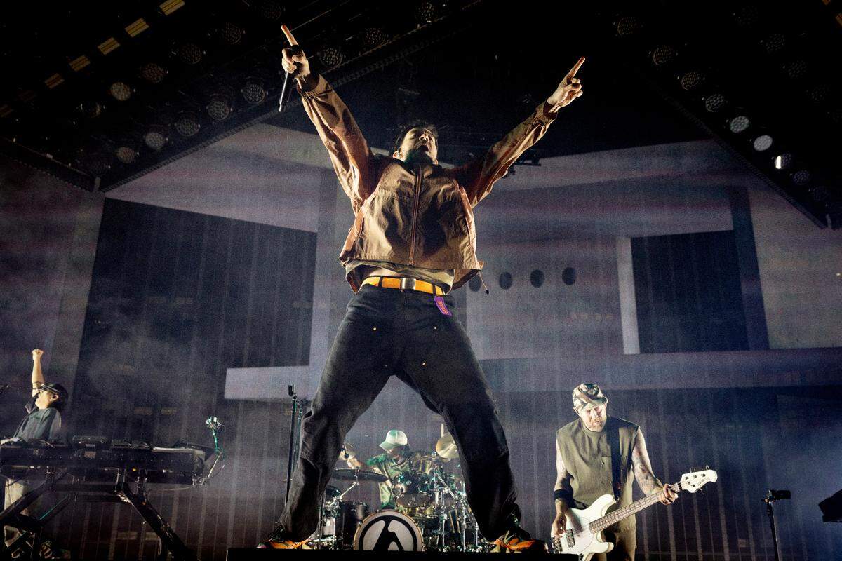 Linkin Park’s Mike Shinoda encourages the crowd on the “From Zero World Tour 2025” at Raleigh, N.C.’s Lenovo Center, Tuesday night, May 6, 2025.