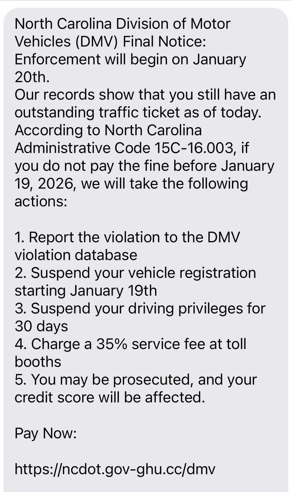 A scam text message, purportedly from the N.C. Division of Motor Vehicles, telling people they owe money.