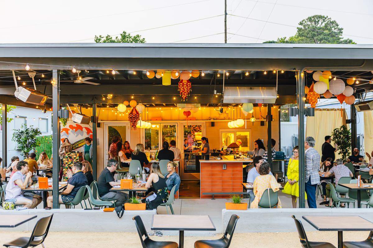 The back patio dining room and bar at Raleigh restaurant Ajja.