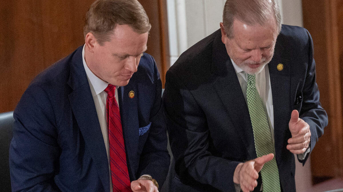 State House Speaker Destin Hall, left, and Senate leader Phil Berger prepare to shake hands with Gov. Josh Stein after the first-term governor gave a State of the State address to the General Assembly in March. 
