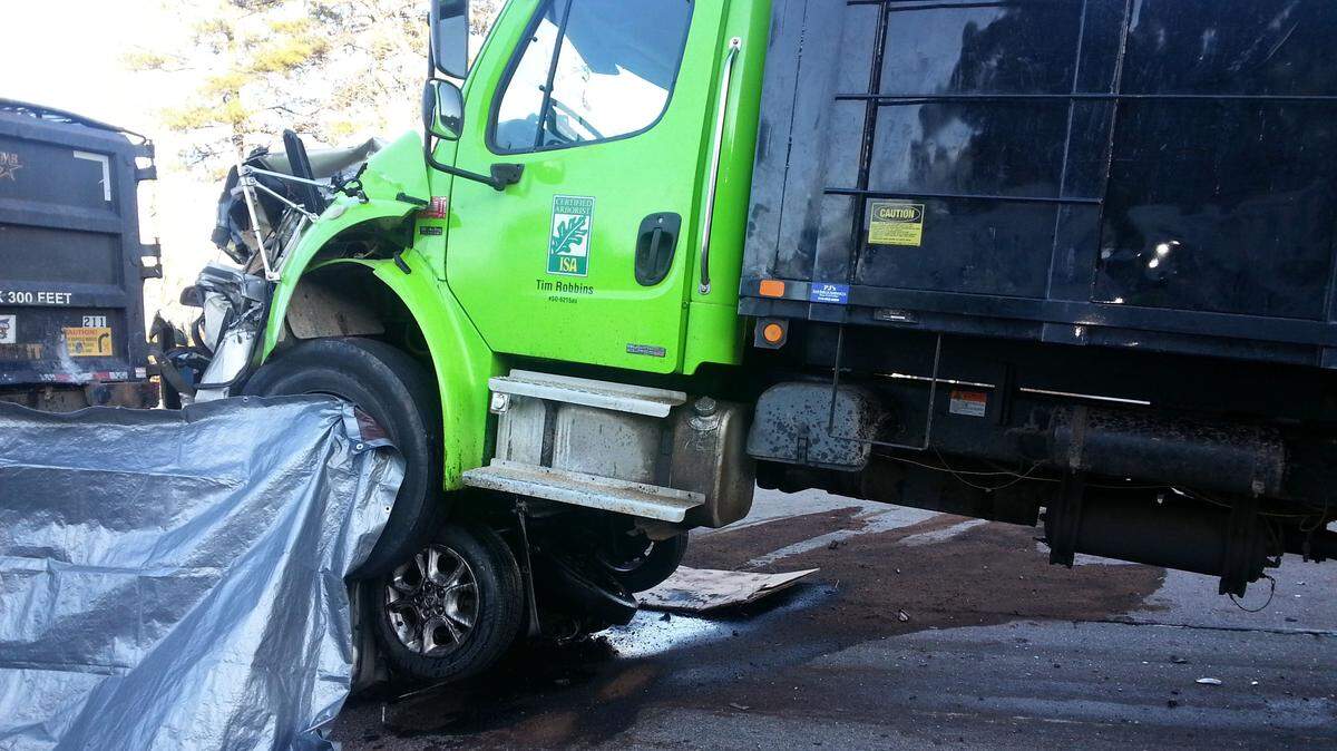 A minivan was crushed between two trucks at a wreck on Capital Boulevard/U.S. 1 near Burlington Mills Road on March 22, 2016, in Wake County. Michelle S. Barlow was driving the minivan and was killed.