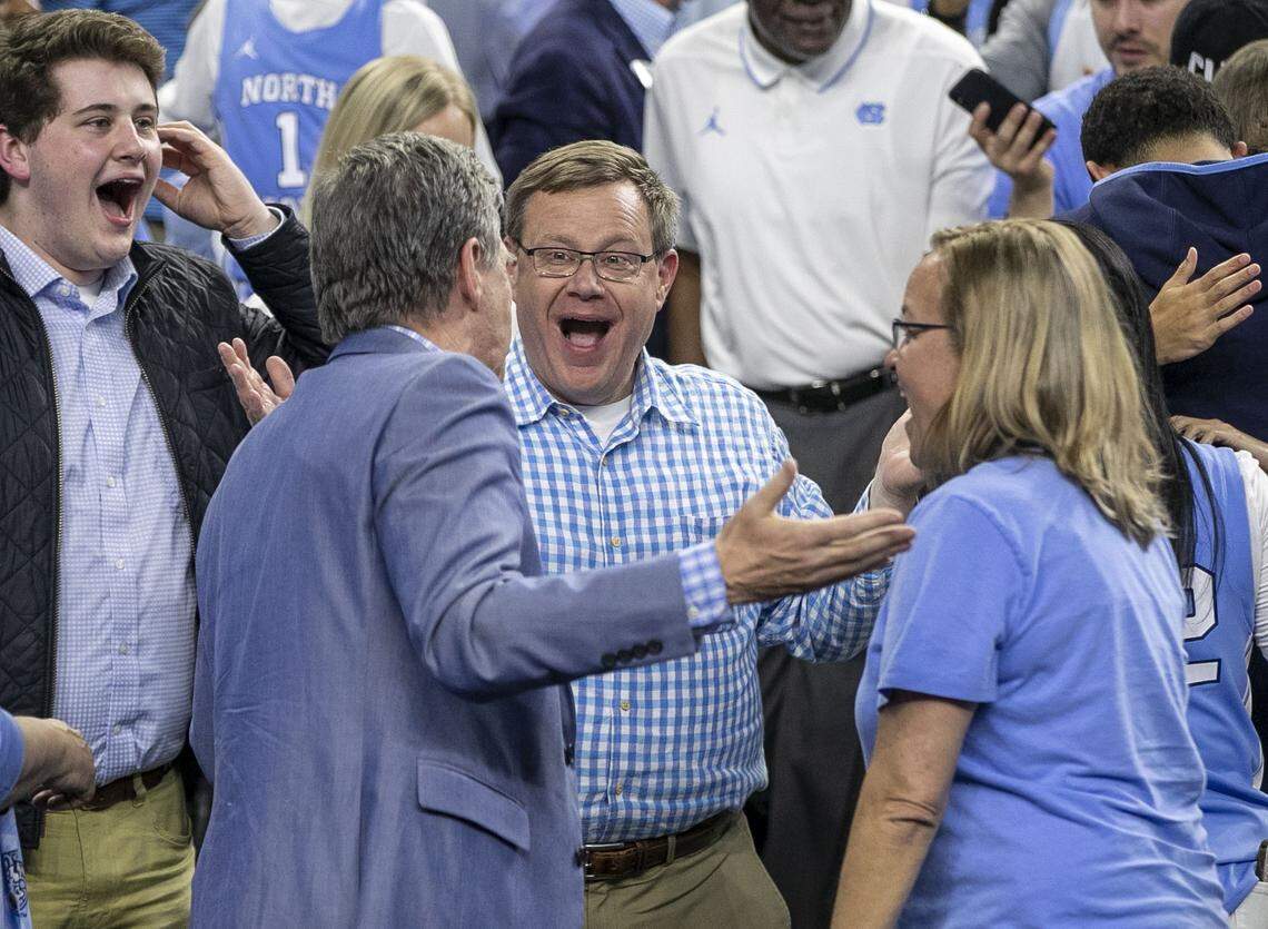 N.C. House Speaker Tim Moore is a UNC-Chapel Hill graduate, as is Gov. Roy Cooper. Moore and Cooper are seen here in a file photo celebrating UNC’s win over Duke in the NCAA Final Four semi-final on April 2, 2022 in New Orleans.