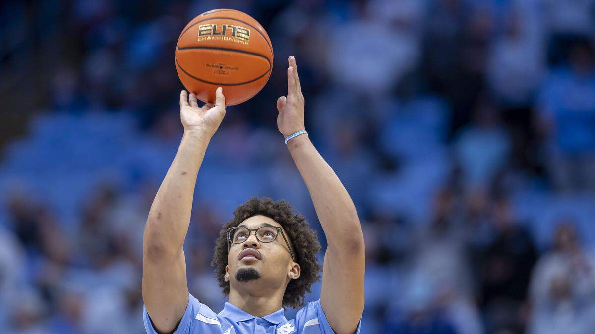 North Carolina guard Seth Trimble (7) works on his shooting form prior to the Tar Heels game against USC Upstate on Saturday, December 13, 2025 at the Smith Center in Chapel Hill, N.C. Trimble continues to recover from surgery five weeks ago after injuring his left arm. He is expected to return to full contact practice soon. 