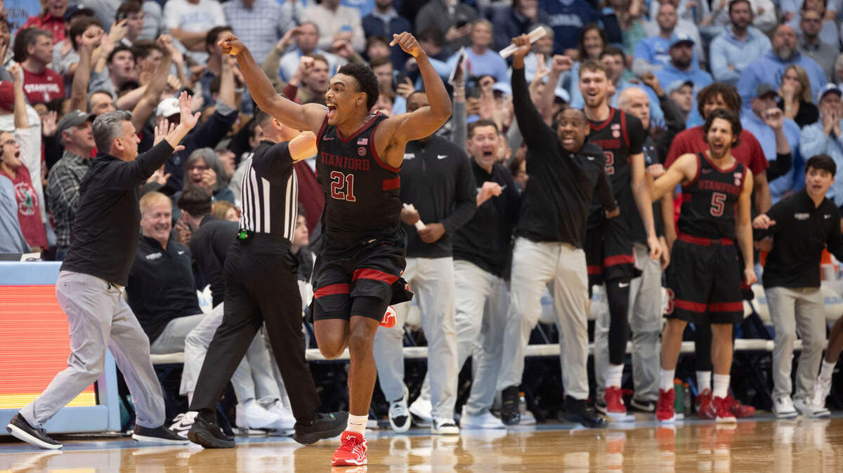 Stanford guard Jaylen Blakes (21) reacts after sinking a two-point basket with :02 seconds to play to give Stanford a 72-71 victory over North Carolina on Saturday, January 18, 2025 at the Smith Center in Chapel Hill, N.C.