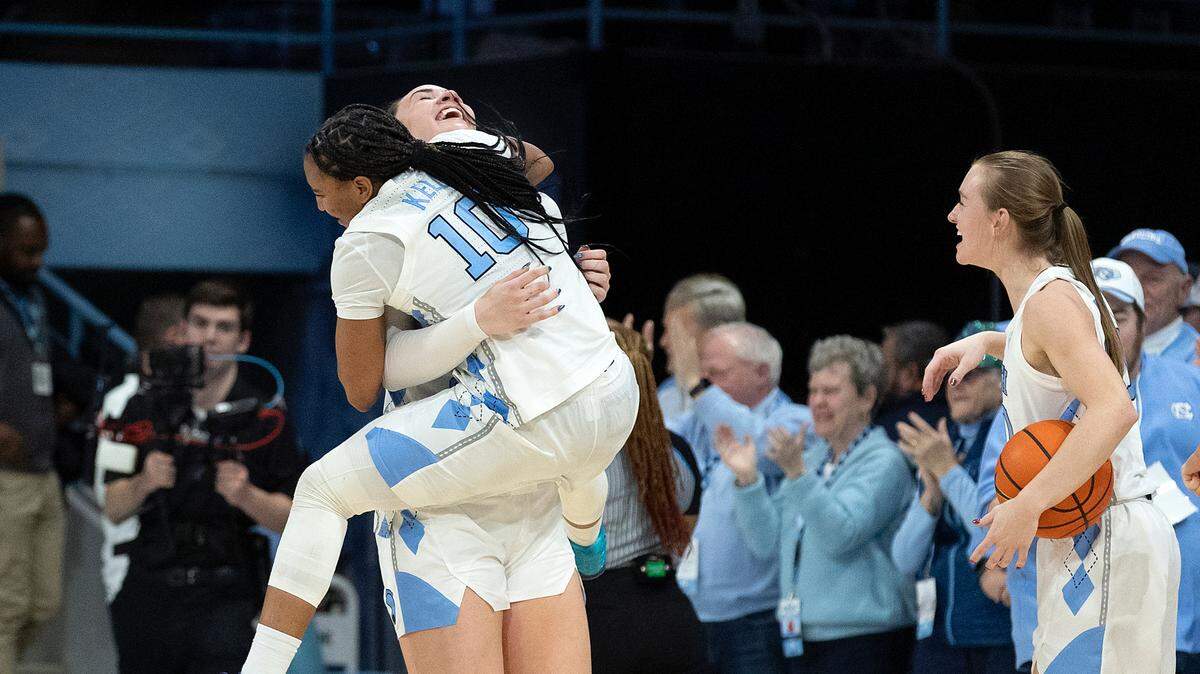 North Carolina’s Reniya Kelly and Blanca Thomas celebrate following the Tar Heels’ 53-46 overtime victory over Duke on Thursday, Jan. 9, 2025, at Carmichael Arena in Chapel Hill, N.C.