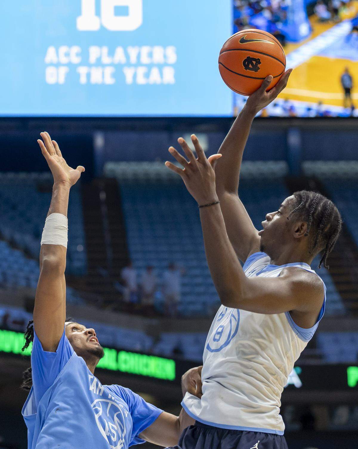 North Carolina forward Caleb Wilson (8) puts up a shot against North Carolina forward Jarin Stevenson (15) during the Blue-White scrimmage on Saturday, October 4, 2025 at the Smith Center in Chapel Hill, N.C.