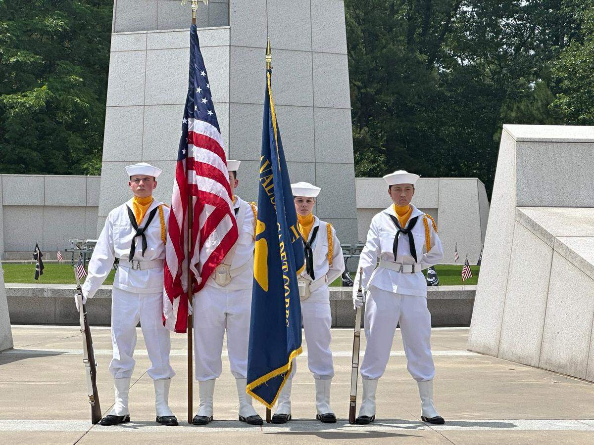 Members of the Raleigh Battalion of the U.S. Naval Sea Cadets present the colors at the Memorial Day observance at Veterans Freedom Park in Cary on Monday, May 27, 2024.