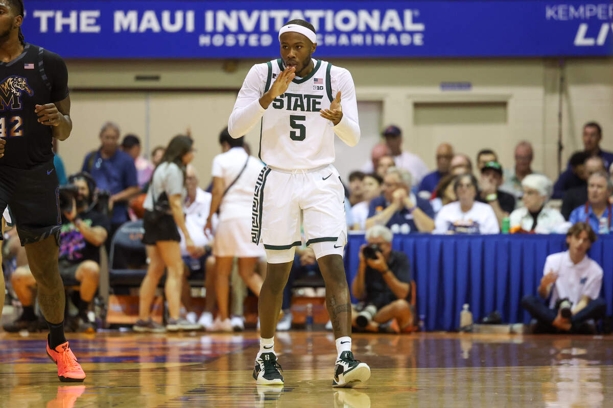 Tre Holloman of the Michigan State Spartans applauds a play during the first half of the Maui Invitational against the Memphis Tigers at the Lahaina Civic Center on Nov. 26, 2024 in Lahaina, Hawaii. Holloman will return to Maui this year with N.C. State.