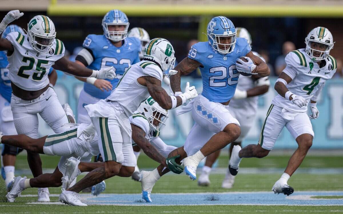 North Carolina running back Omarion Hampton (28) carries the ball for 26 yards during the first quarter against Charlotte on Saturday, September 7, 2024 at Kenan Stadium in Chapel Hill, N.C.