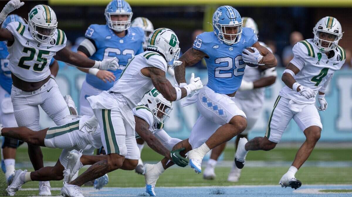 North Carolina running back Omarion Hampton (28) carries the ball for 26 yards during the first quarter against Charlotte on Saturday, September 7, 2024 at Kenan Stadium in Chapel Hill, N.C.