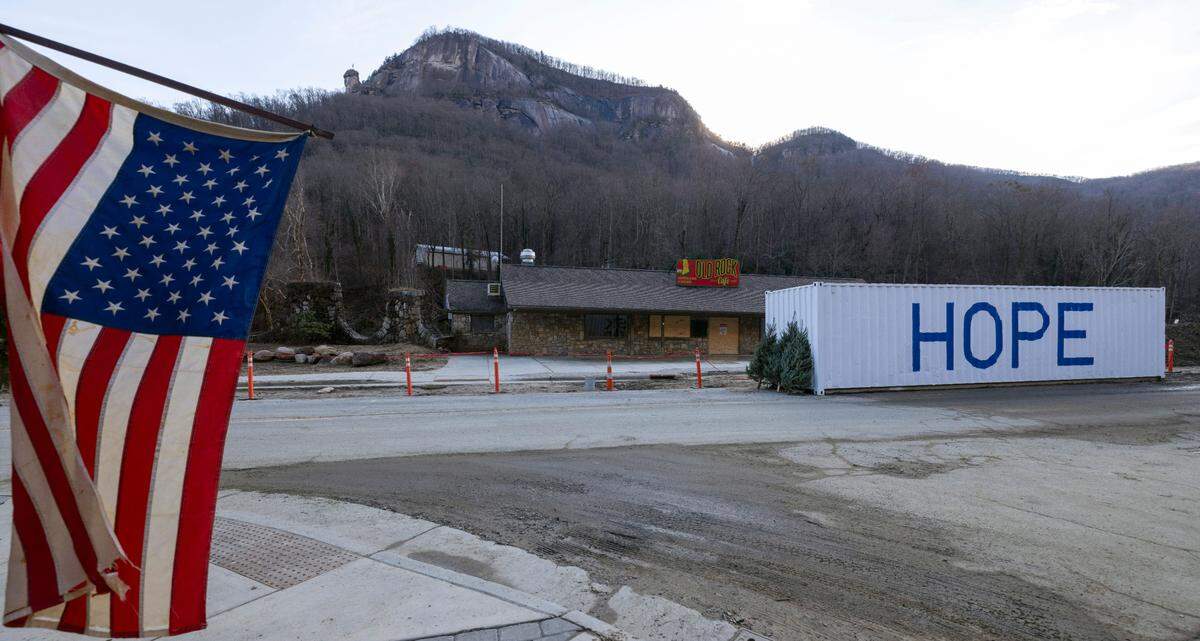 A storage container inscribed with “Hope” along the deserted Main Street in Chimney Rock, N.C. on Wednesday, December 18, 2024. Historic flooding of the Rocky Broad River from Hurricane Helene caused catastrophic damaged to the village below the famed Chimney Rock State Park.