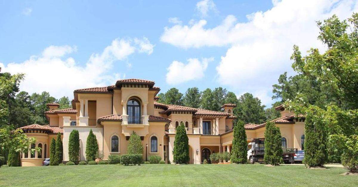 #2 10 Portofino Place, Durham. Assessed building value: $2,871,549. Land value: $316,025. Heated sq. ft.: 13,350. Acres: 4.64. Built in 2009. 5 full baths, 3 half baths, 5 bedrooms.
