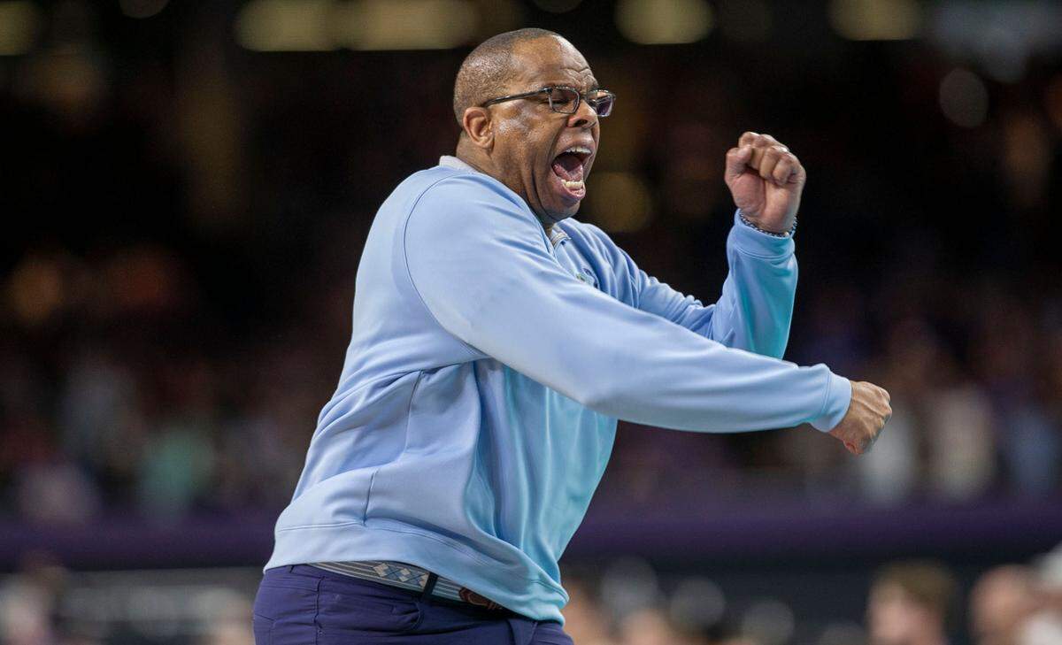 North Carolina head coach Hubert Davis reacts after R.J. Davis drew a foul from Kansas’ Remy Martin with the score tied 57-57 in the second half during the NCAA Championship game on Monday, April 4, 2022 at Caesars Superdome in New Orleans, La.