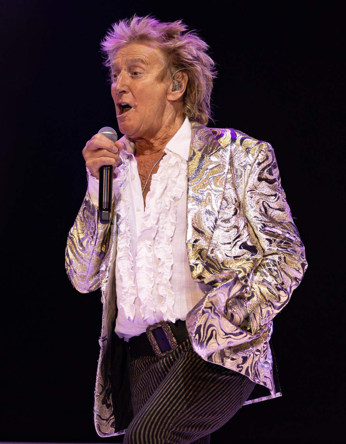 Rod Stewart opens his “One Last Time” tour show at Raleigh, N.C.’s Coastal Credit Union Music Park at Walnut Creek, Tuesday night, July 8, 2025.