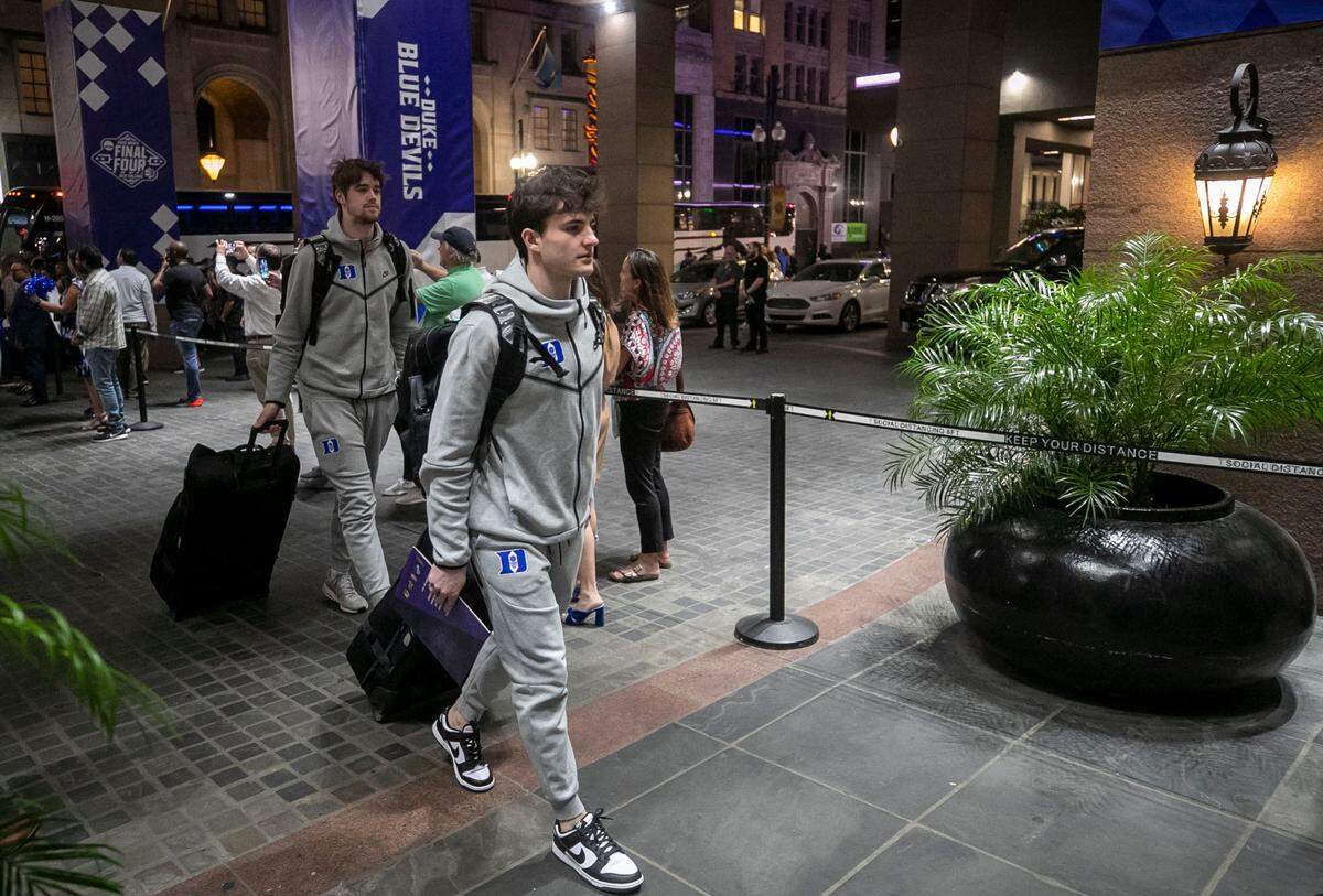 Duke’s Michael Savarino walks into the Blue Devils’ team hotel, The InterContinental, for the NCAA Final Four on Tuesday, March 29, 2022 in New Orleans, La.