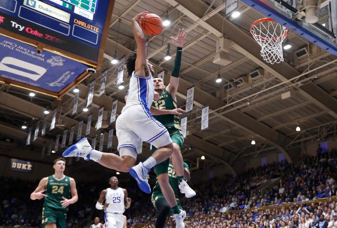 Duke’s Jared McCain (0) heads to the basket to score as Charlotte’s Jackson Threadgill (12) defends during Duke’s 80-56 victory over Charlotte at Cameron Indoor Stadium in Durham, N.C., Saturday, Dec. 9, 2023.