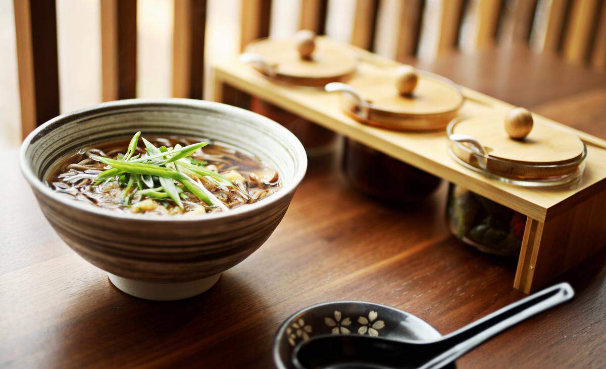 The  buckwheat soba  in dashi broth served with Japanese pickle at M Tempura in Durham.