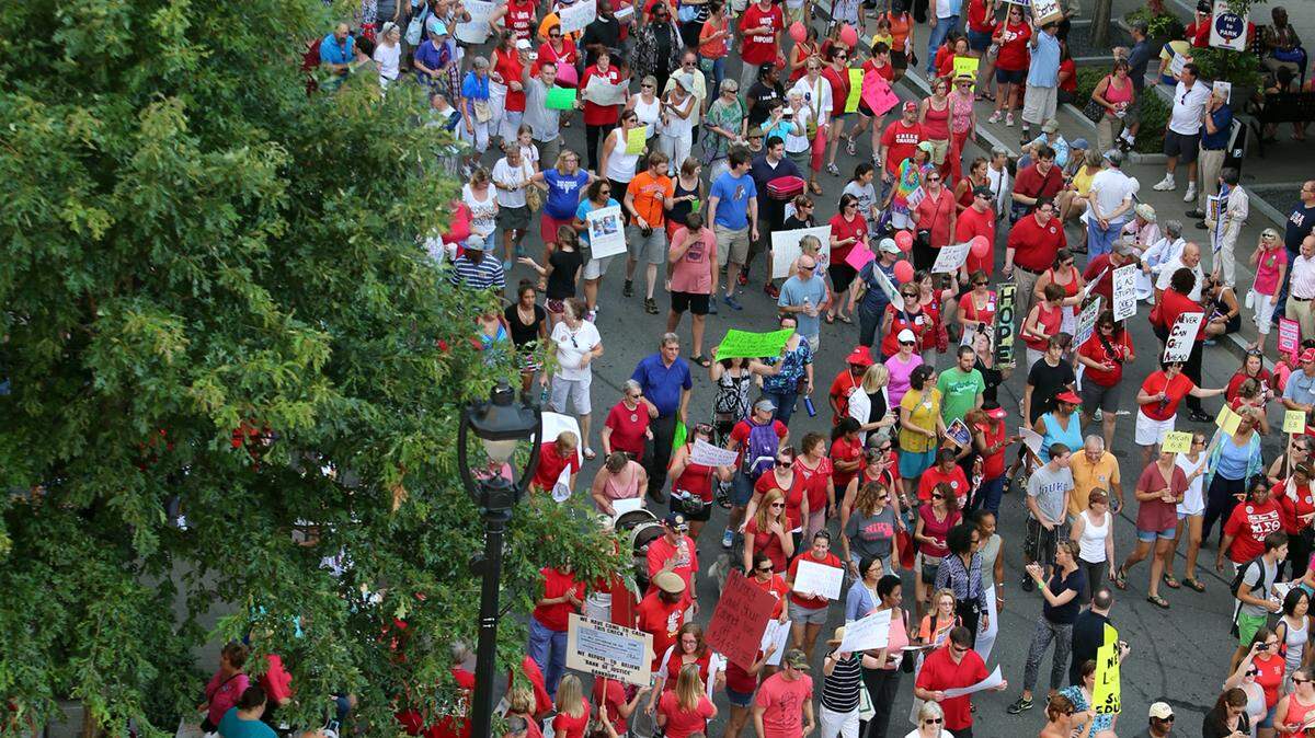 Thousands of protesters march down Fayetteville Street at the final Moral Monday demonstration on Monday, July 29, 2013 in downtown Raleigh. A new coalition seeks to reignite opposition to actions taken by NC’s Republican-led legislature.