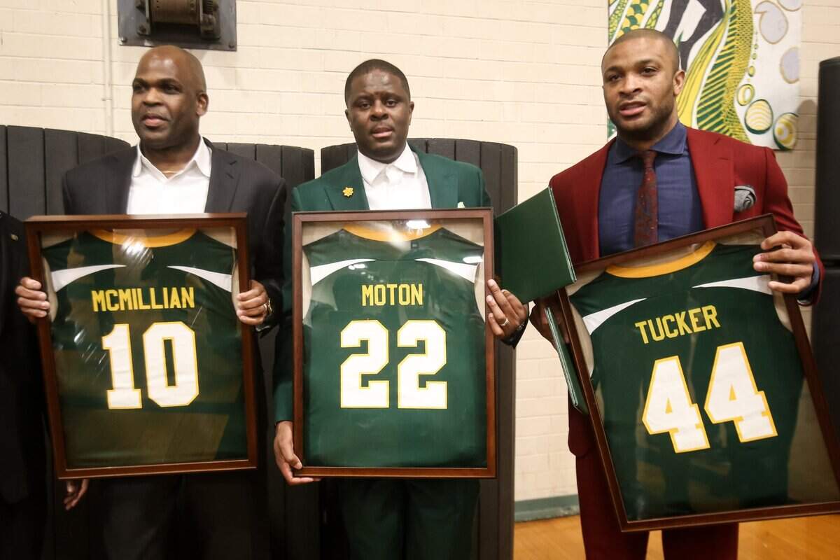 Enloe High School honors alums, from left, Nate McMillan, LeVelle Moton, and PJ Tucker pose after Enloe High School honored the trio during the school’s “Night of Legends” in 2019.