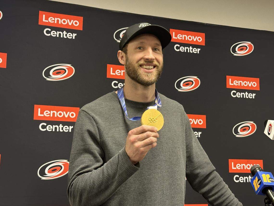 Jaccob Slavin, defenseman for the Carolina Hurricanes, with the gold medal he won with the U.S. men’s hockey team at the 2026 winter Olympics in Milan, Italy, on Feb. 22, 2026.