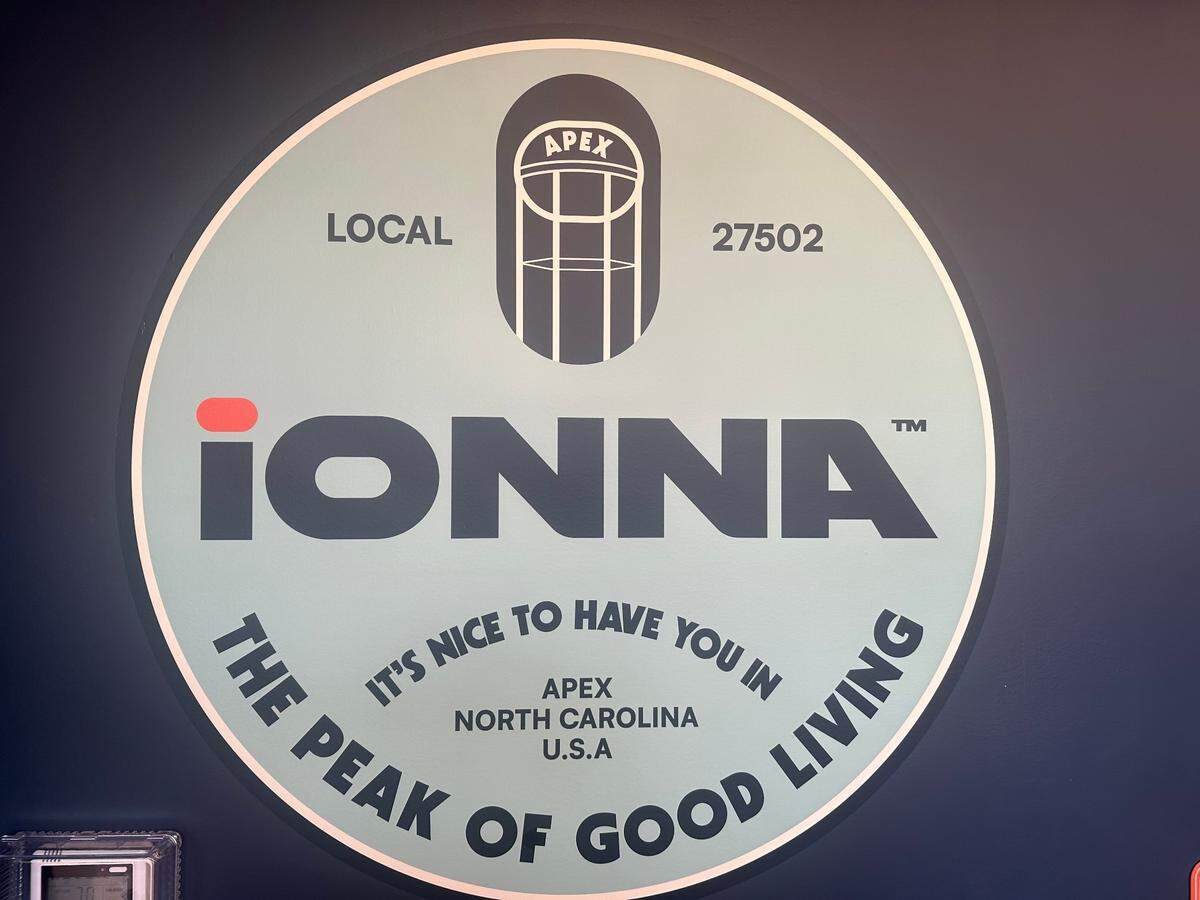 Each of the IONNA recharging stations will have a customized logo, like this one for the Apex station that opened Dec. 27, 2024.