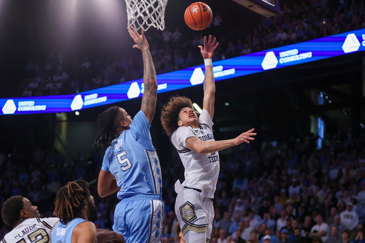 Jan 30, 2024; Atlanta, Georgia, USA; Georgia Tech Yellow Jackets guard Naithan George (2) shoots over North Carolina Tar Heels forward Armando Bacot (5) in the second half at McCamish Pavilion.
