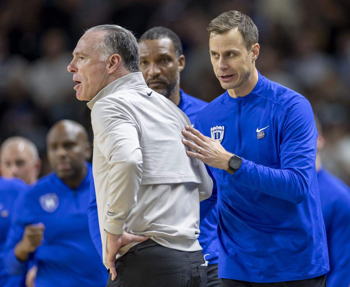 Duke coach Jon Scheyer greets TCU head coach Jamie Dixon following the Blue Devils’ victory on Saturday, March 21, 2026, during the second round of the NCAA Tournament at Bon Secours Arena in Greenville, S.C. 