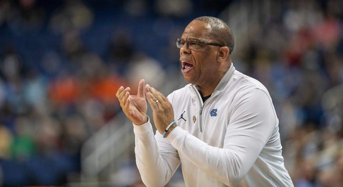 North Carolina coach Hubert Davis applauds his team as they open a lead over Boston College in the second round of the ACC Tournament on Wednesday, March 8, 2023 at the Greensboro Coliseum in Greensboro, N.C.