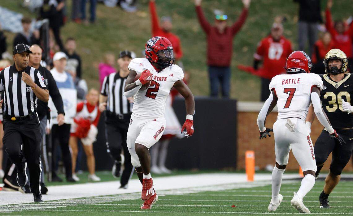 N.C. State linebacker Jaylon Scott (2) heads downfield to score after intercepting Wake Forest’s two-point conversion during the second half of N.C. State’s 26-6 victory over Wake Forest at Allegacy Stadium in Winston-Salem, N.C., Saturday, Nov. 11, 2023.