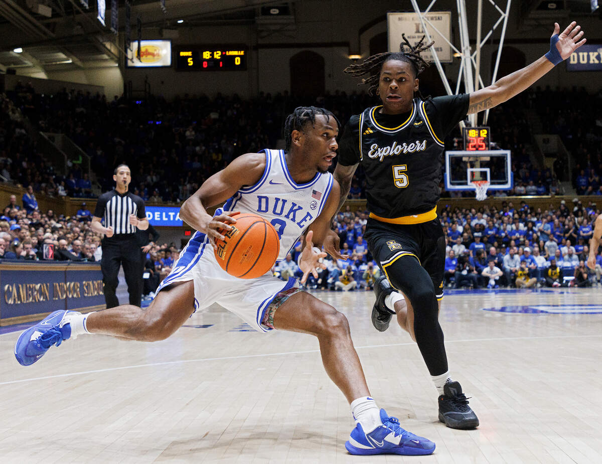 Duke’s Jeremy Roach drives past La Salle’s Khalil Brantley during the first half of the Blue Devils’ 95-66 win on Tuesday, Nov. 21, 2023, at Cameron Indoor Stadium in Durham, N.C.