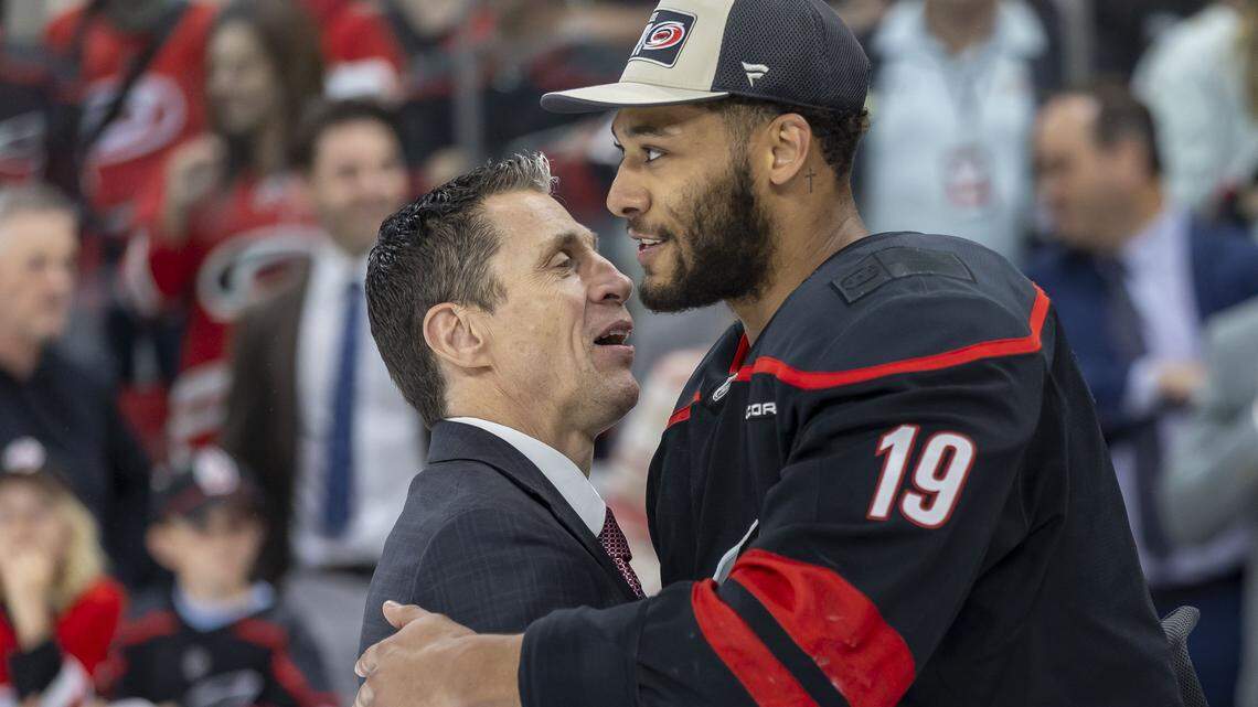 Carolina Hurricanes win leads to special moment for K’Andre Miller and baby son
