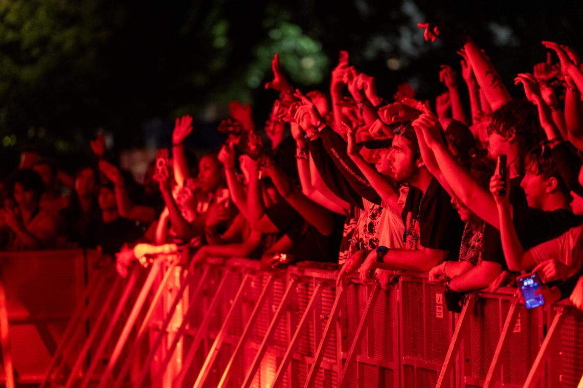 Concert-goers watch JPEGMAFIA perform at Moore Square during the Hopscotch Music Festival in Raleigh on Thursday, Sept 6, 2024.