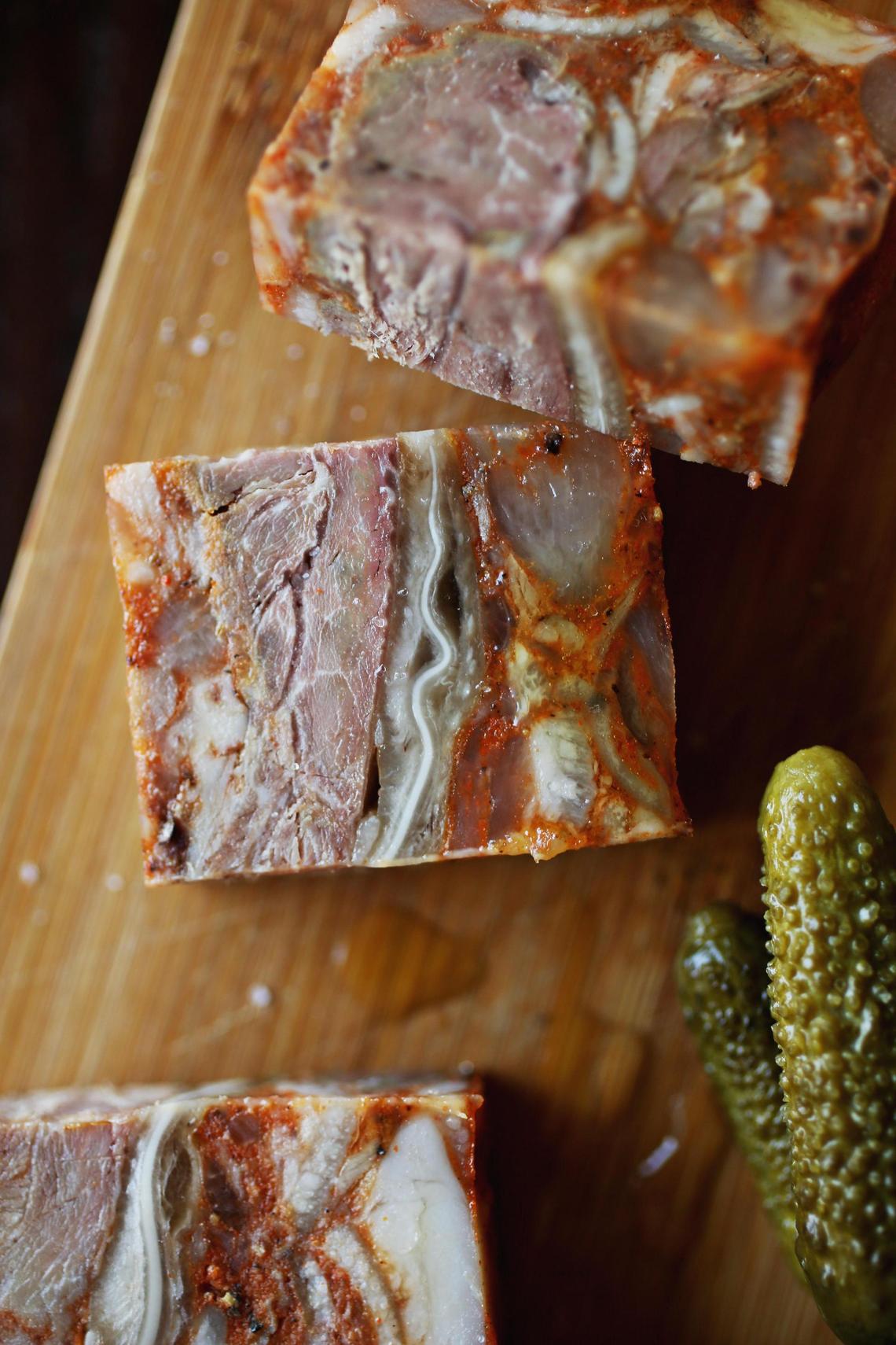 COPA’s presentation of Queso de Cabeza includes the Cuban-style pork terrine served with toast, cornichons pickles, and olives.