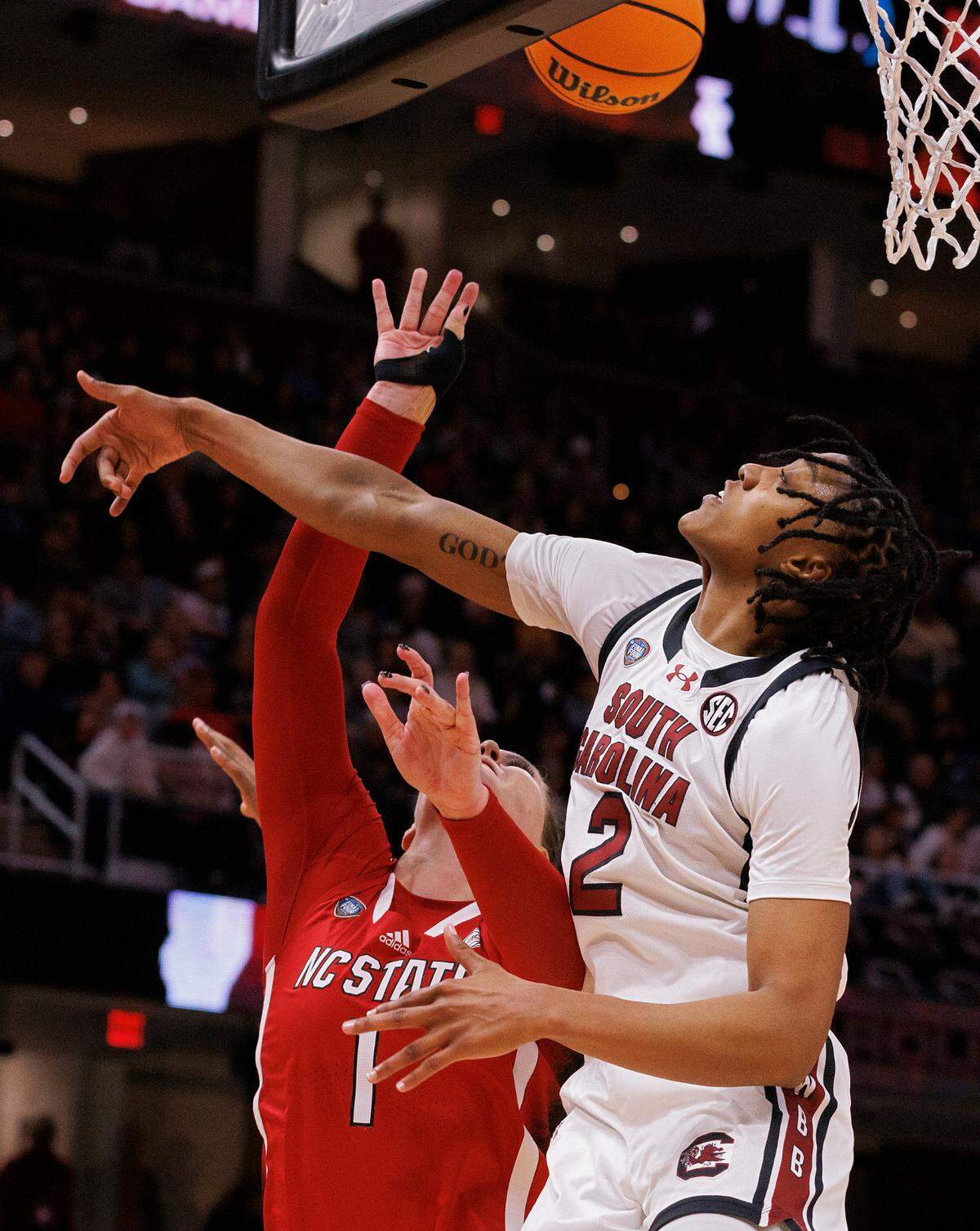 South Carolina’s Ashlyn Watkins contests a shot by N.C. State’s River Baldwin during the second half of the Wolfpack’s 78-59 Final Four loss at Rocket Mortgage FieldHouse on Friday, April 5, 2024, in Cleveland, Ohio.