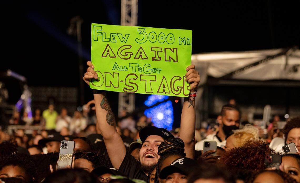 A fan holds up a sign during Ari Lennox’s set at the Dreamville Festival in Raleigh, N.C., Saturday, April 1, 2023.