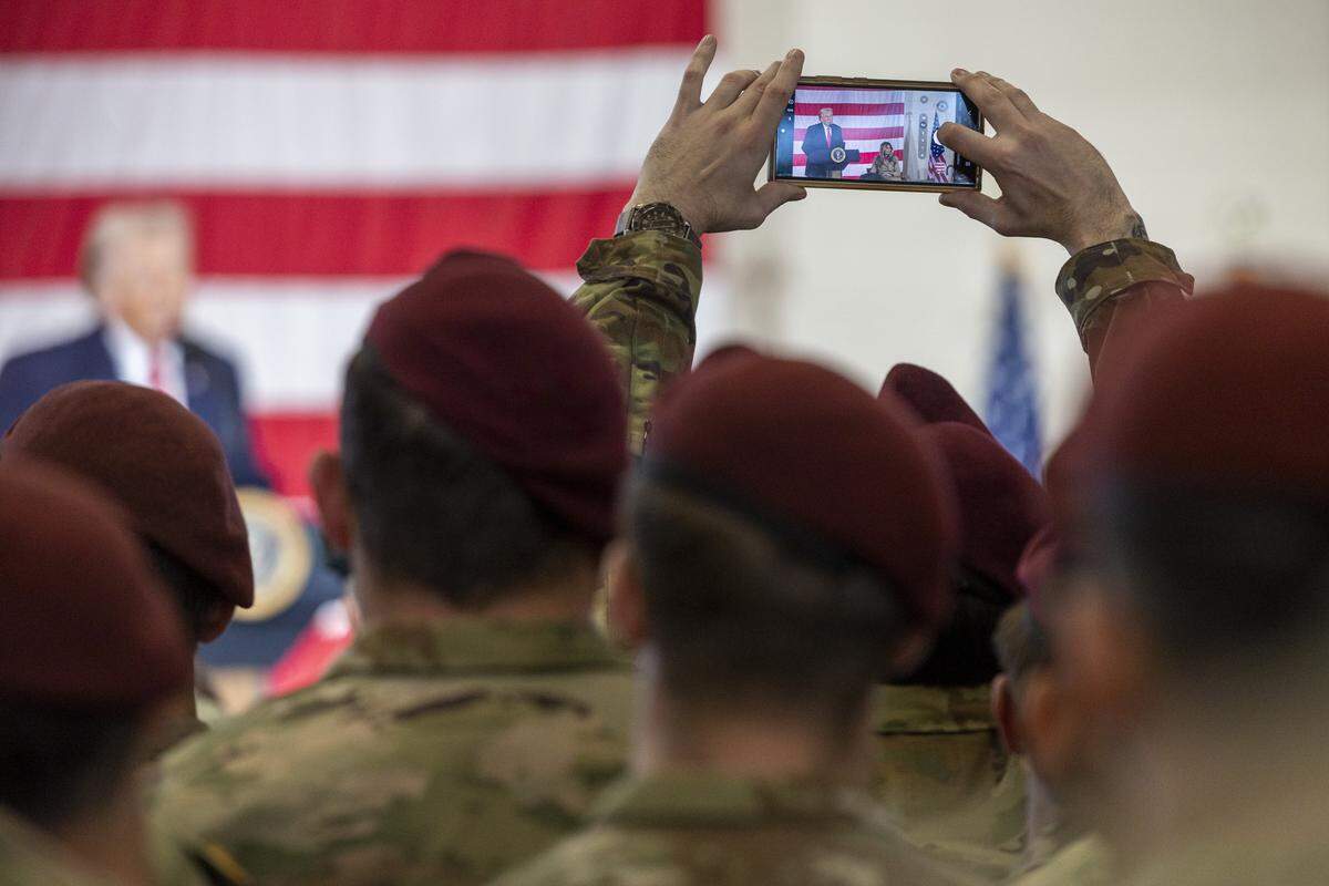 Soldiers from the XVIII Airborne Corps listen to President Donald Trump speak at Fort Bragg in Fayetteville Friday, Feb. 13, 2026.