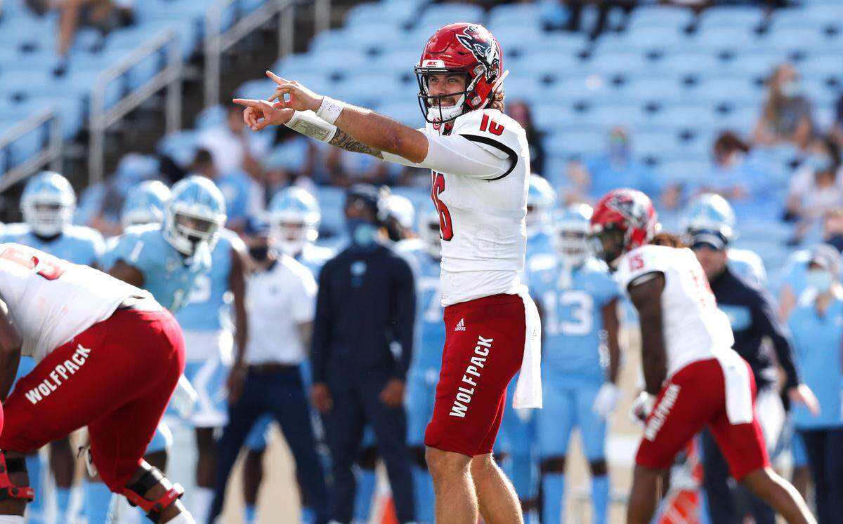 N.C. State quarterback Bailey Hockman (16) directs the offense during the second half of UNC’s 48-21 victory over N.C. State at Kenan Stadium in Chapel Hill, N.C., Saturday, Oct. 24, 2020.