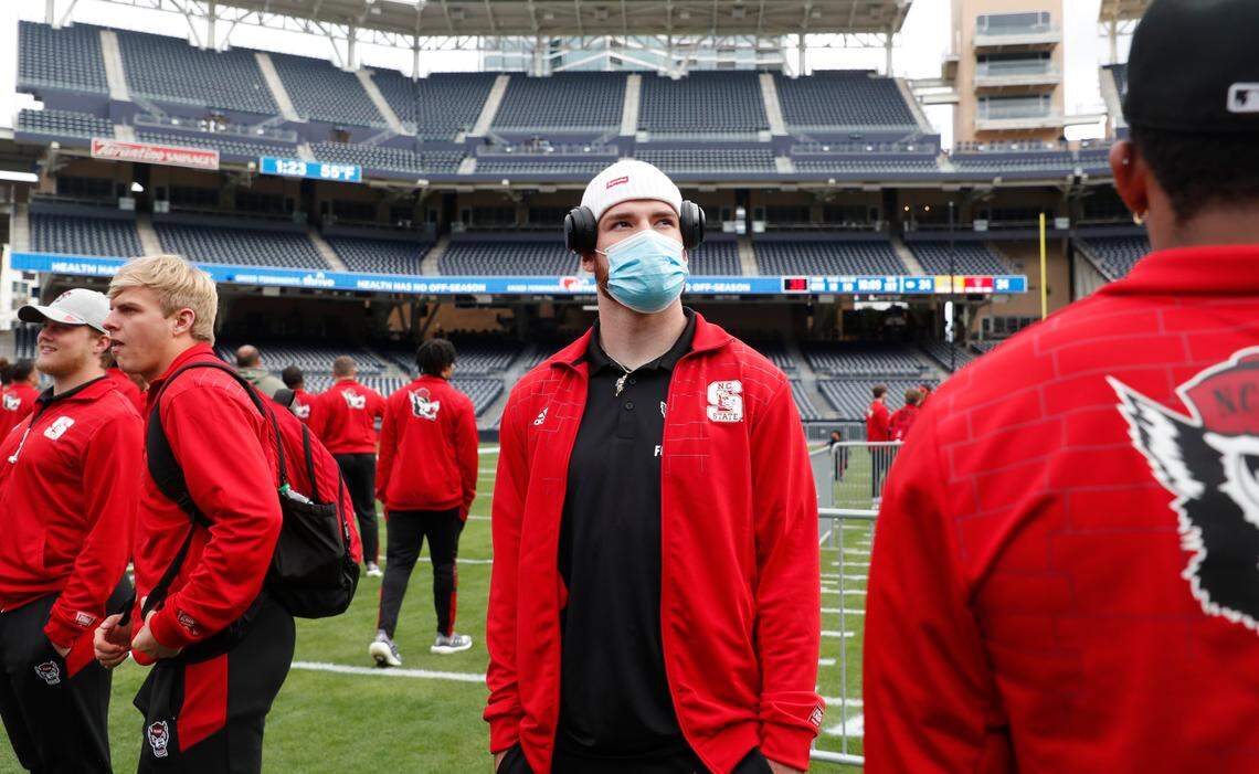 N.C. State quarterback Devin Leary takes in the ballpark as N.C. State football team tours the field at Petco Park in San Diego, CA Monday, Dec. 27, 2021, a day before the Holiday Bowl.