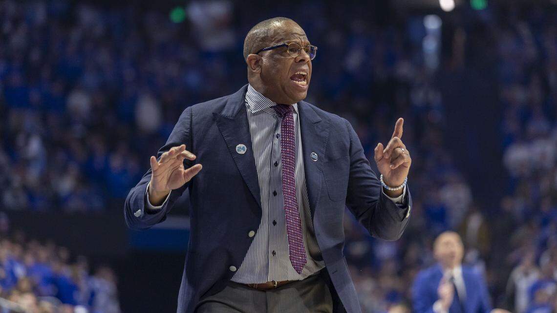 North Carolina coach Hubert Davis directs his team on defense in the first half against Kentucky on Tuesday, December 2, 2025 at Rupp Arena in Lexington, Ky.