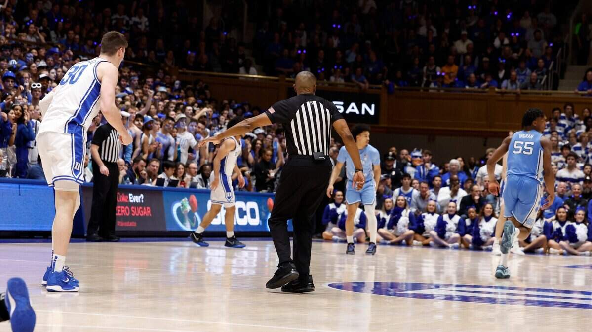 Official Teddy Valentine motions to Duke’s Kyle Filipowski (30) after he was involved with North Carolina’s Harrison Ingram (55) during the first half of Duke’s game against UNC at Cameron Indoor Stadium in Durham, N.C., Saturday, March 9, 2024.