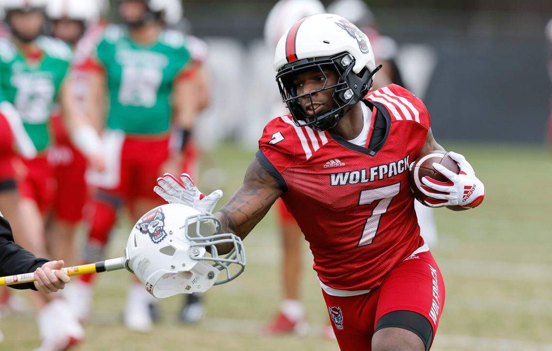 N.C. State running back Jordan Waters (7) runs a drill during the Wolfpack’s first spring practice Tuesday, Feb. 27, 2024.